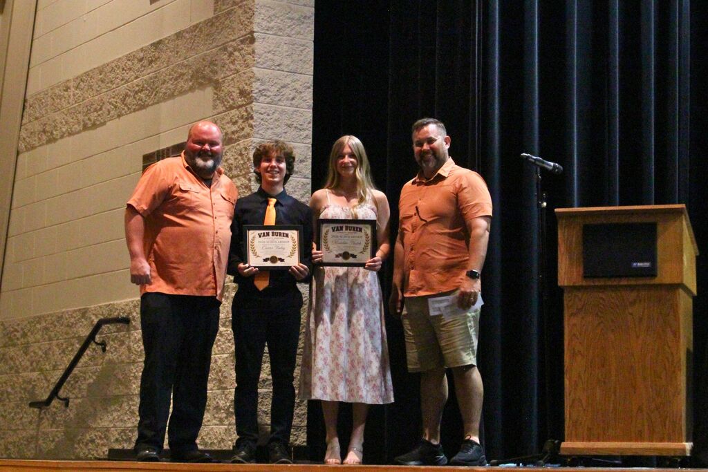 Carter and Maddie, winners of the VB Athletic Boosters scholarship, pose with Bryan Whitticar and Jason Morey.