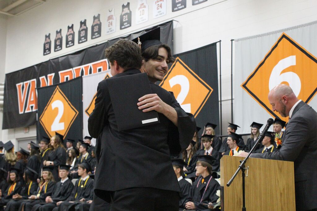Campbell Ferguson is greeted by his most influential teacher, Mr. Addison Carter.