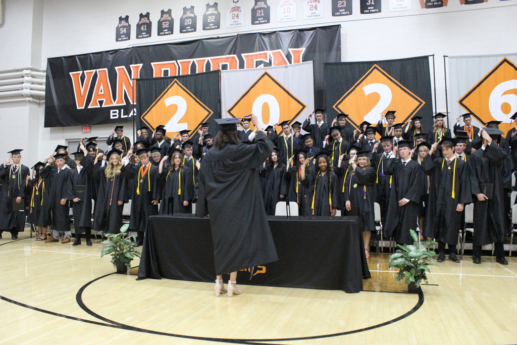 Class President Sadie Thorla-Lopez leads the class as they turn their tassels and officially become Van Buren High School graduates.