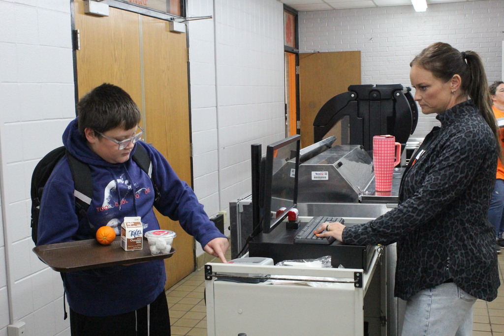 A picture of a student purchasing his breakfast in the MS/HS cafeteria on Monday, September 14, the first day breakfast was offered.