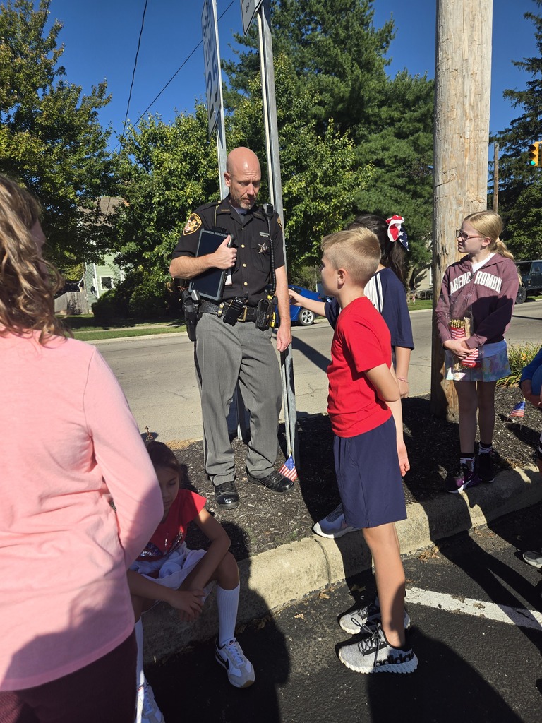A picture of School Resource Officer Deputy Crouch sharing insights related to 9/11.