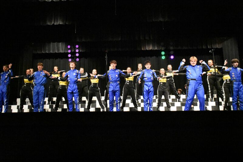 The show choir, The Association, performs at a competition.