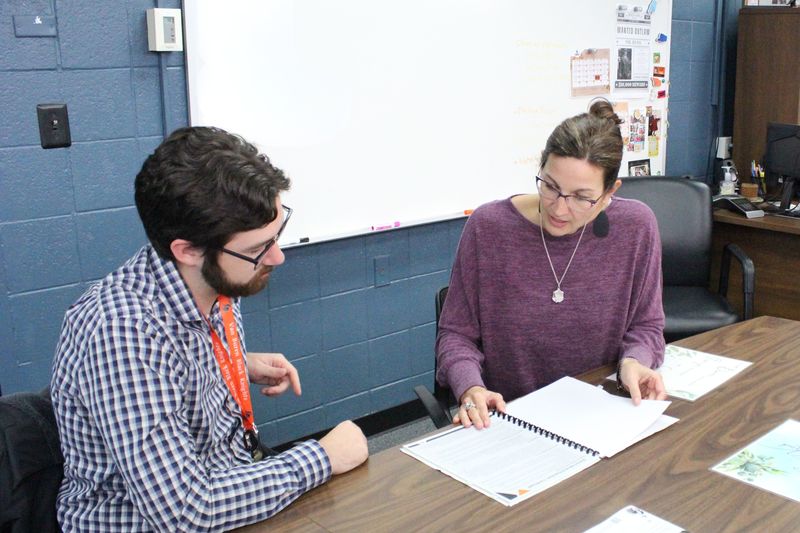 Mr. Borger and Mrs. Bunn confer during a Student Services meeting.