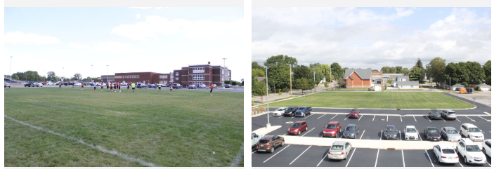 Image of new practice field with green grass, painted lines, and curbs