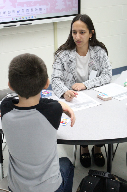 Ms. Danchisen meets with an elementary student.