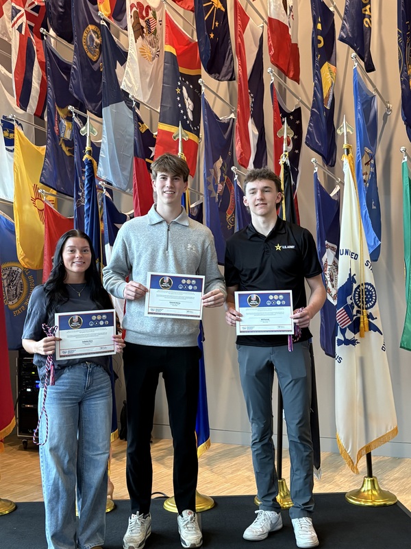 Attendees of the 2026 Ohio Military Signing Day pose with their certificates and graduation cords.