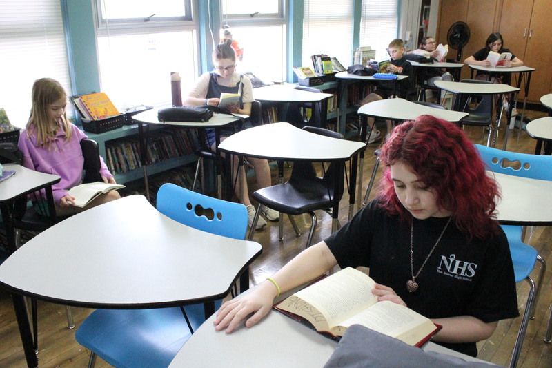 More students read in Mrs. Dishong's classroom reading. 
