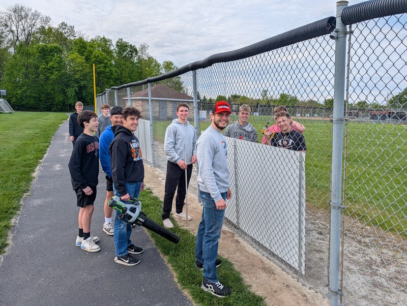 Students work at the Allen Township Sportsplex during service day.