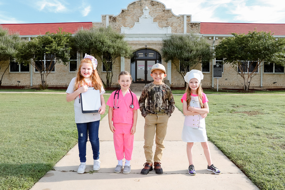 students dressed for career day
