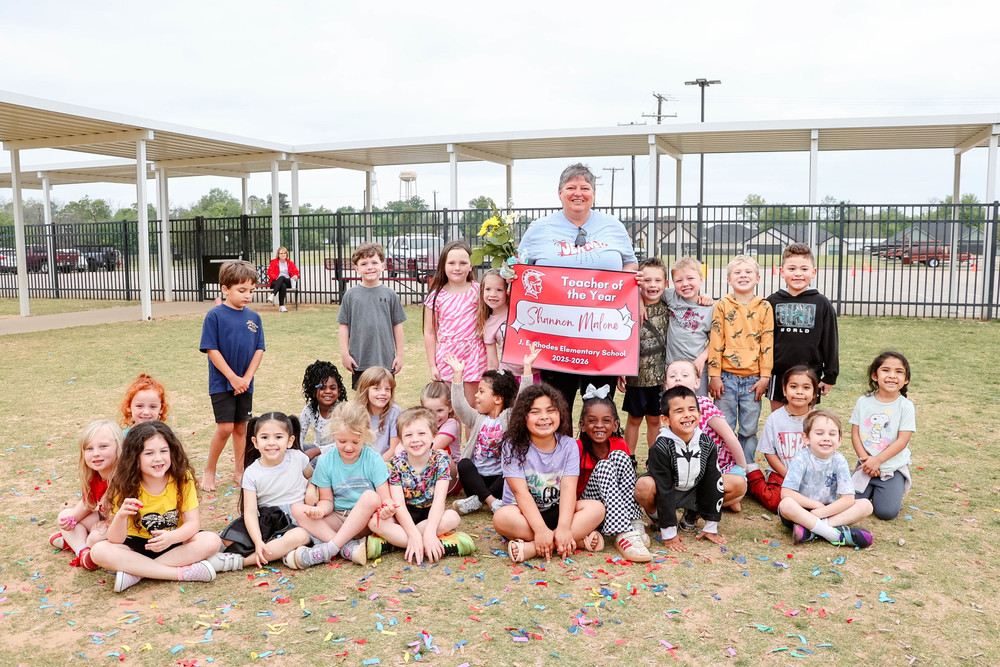 Mrs. Malone with her class