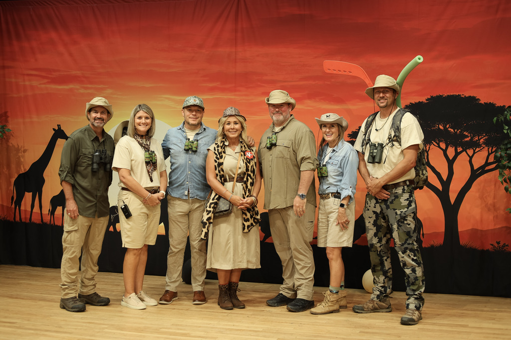 7 adults dressed in safari theme