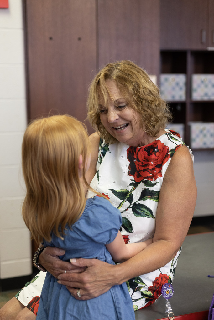 Teacher smiling at a student