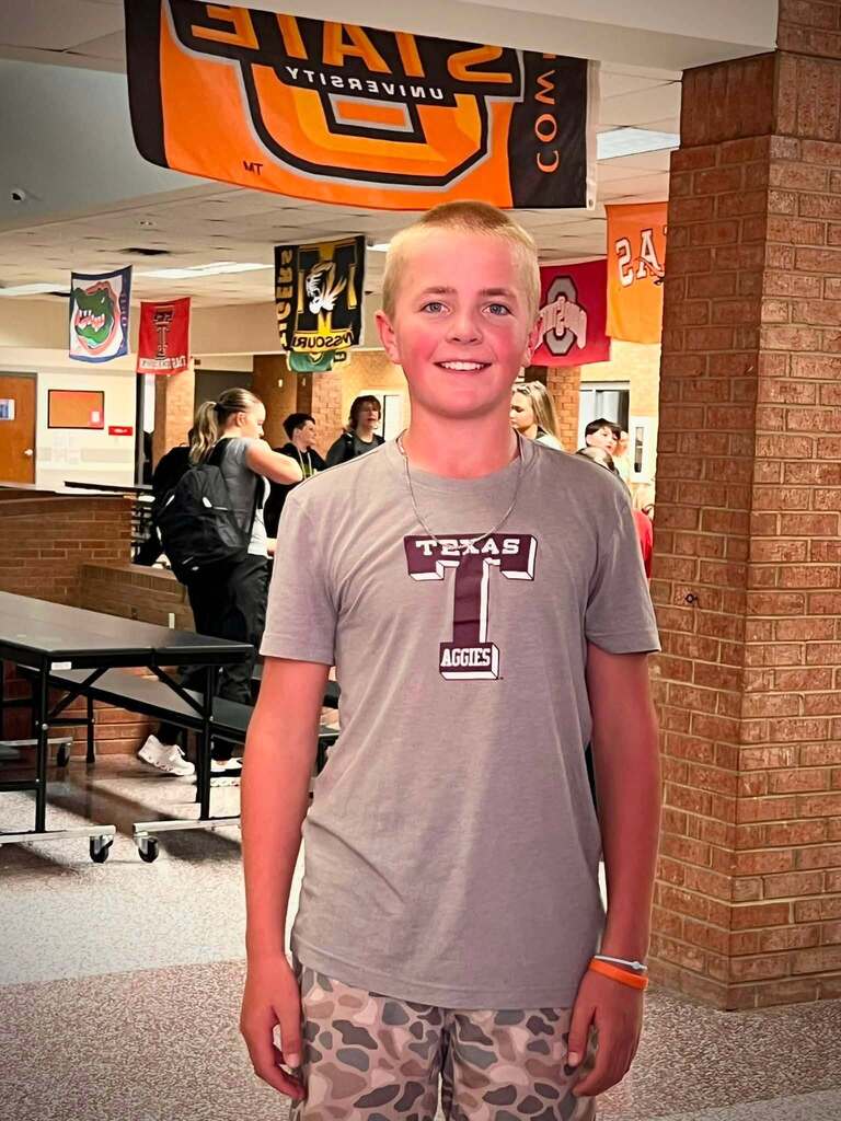 student in school cafeteria
