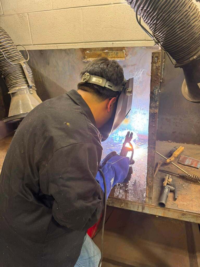 HIGH SCHOOL STUDENT WELDING
