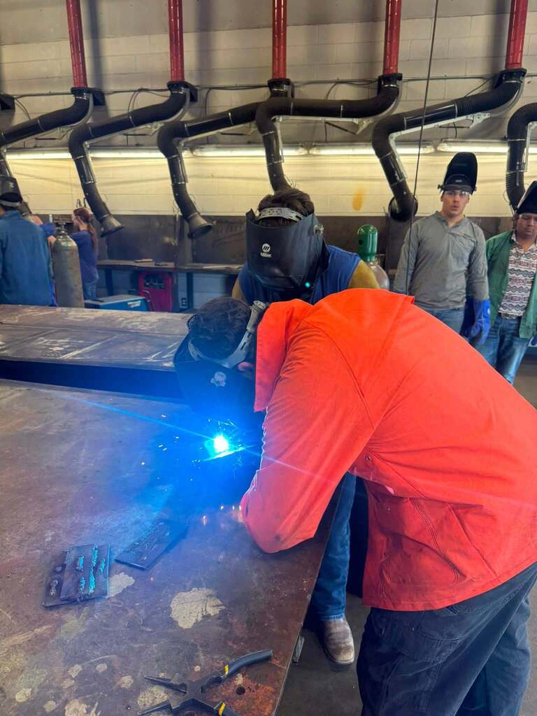 HIGH SCHOOL STUDENT WELDING