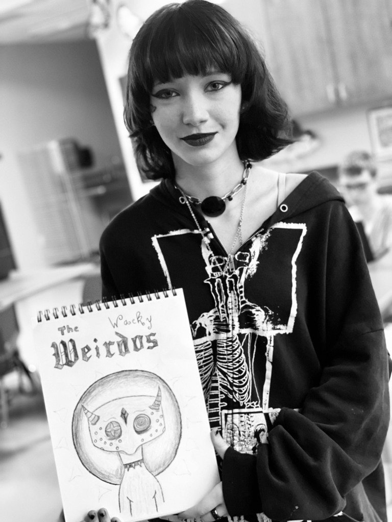 girl holding artwork