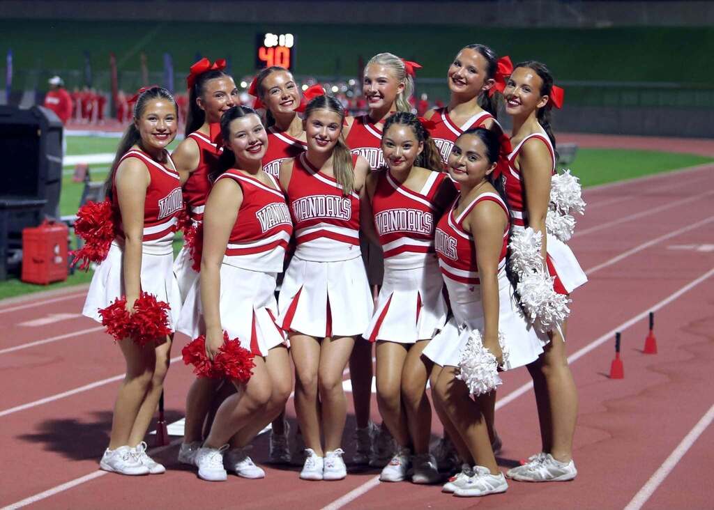 group of high school cheerleaders at a game