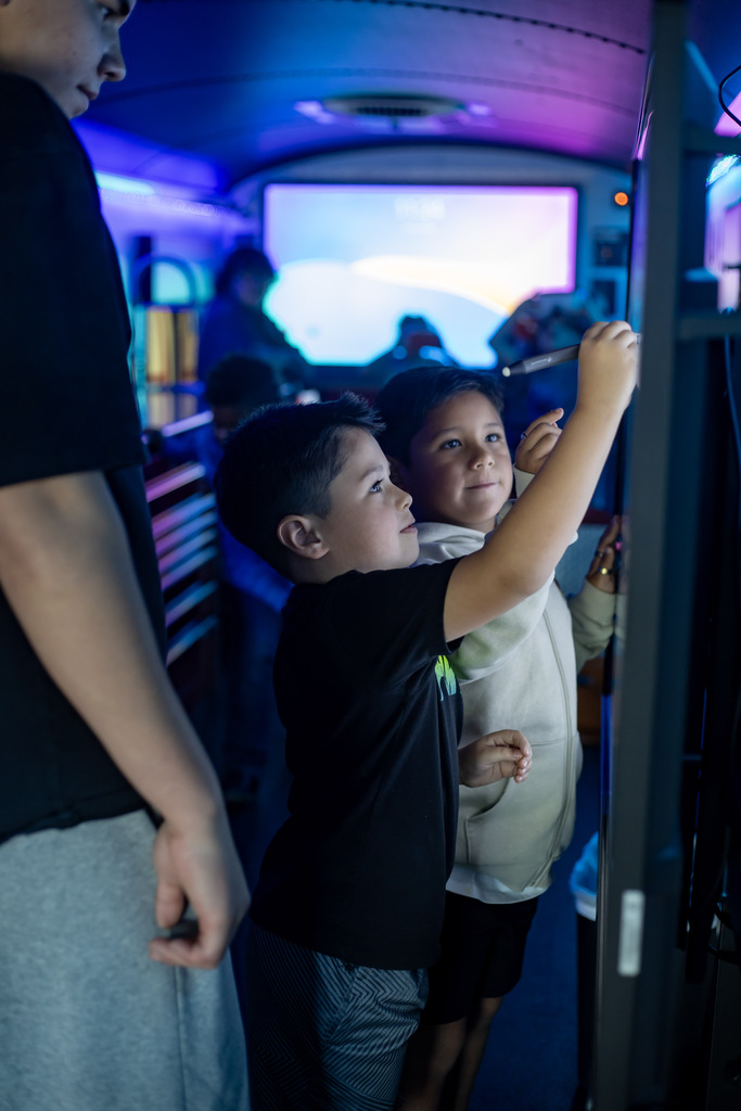 STUDENTS IN THE VAN ISD STEAM BUS