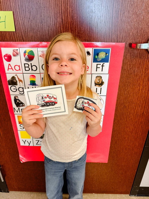 students holding up their mail