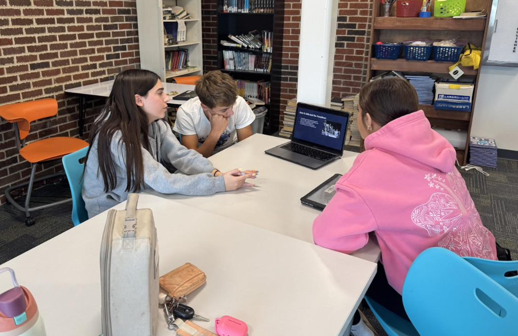 English 2 students presenting in small groups