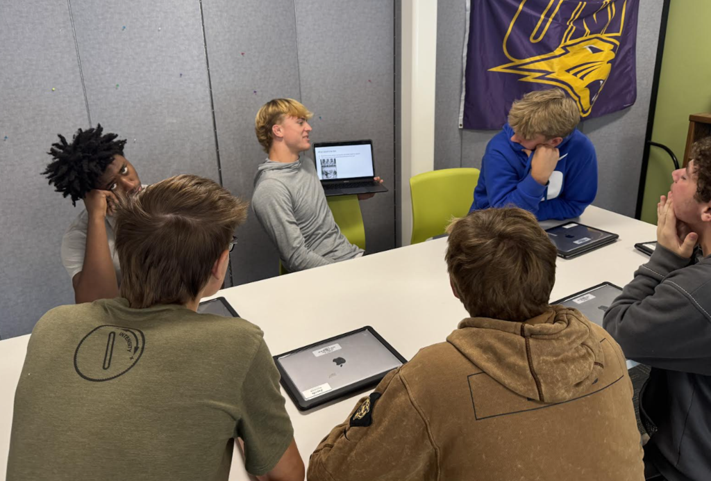 English 2 students presenting in small groups