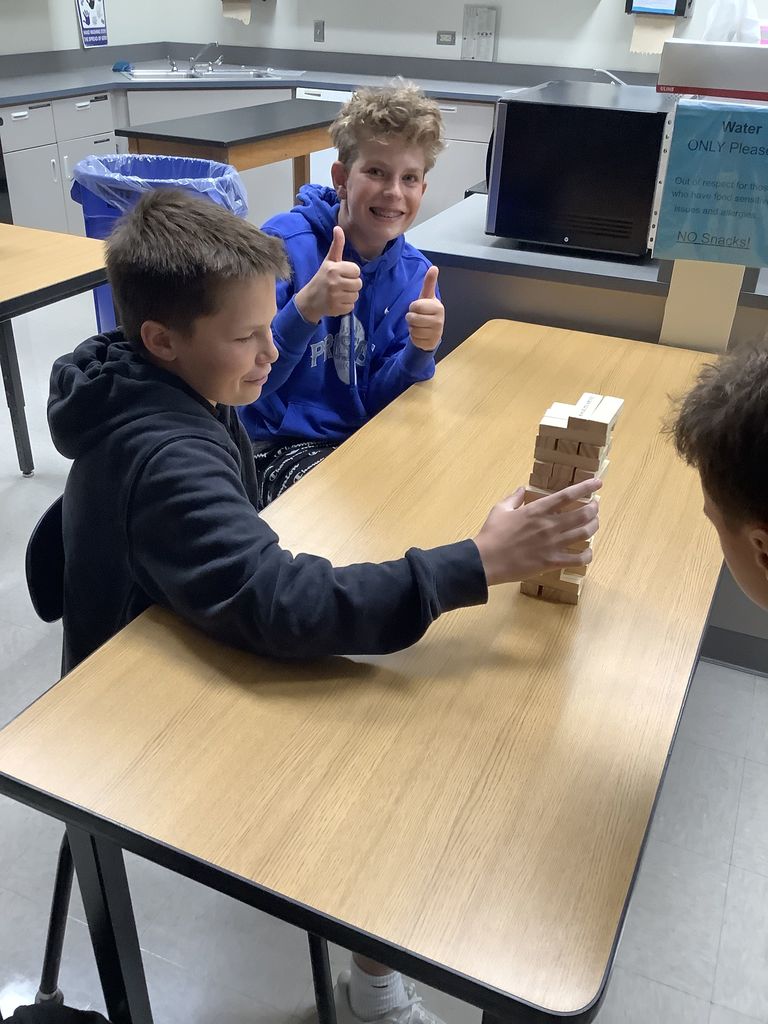 8th graders playing Jenga.