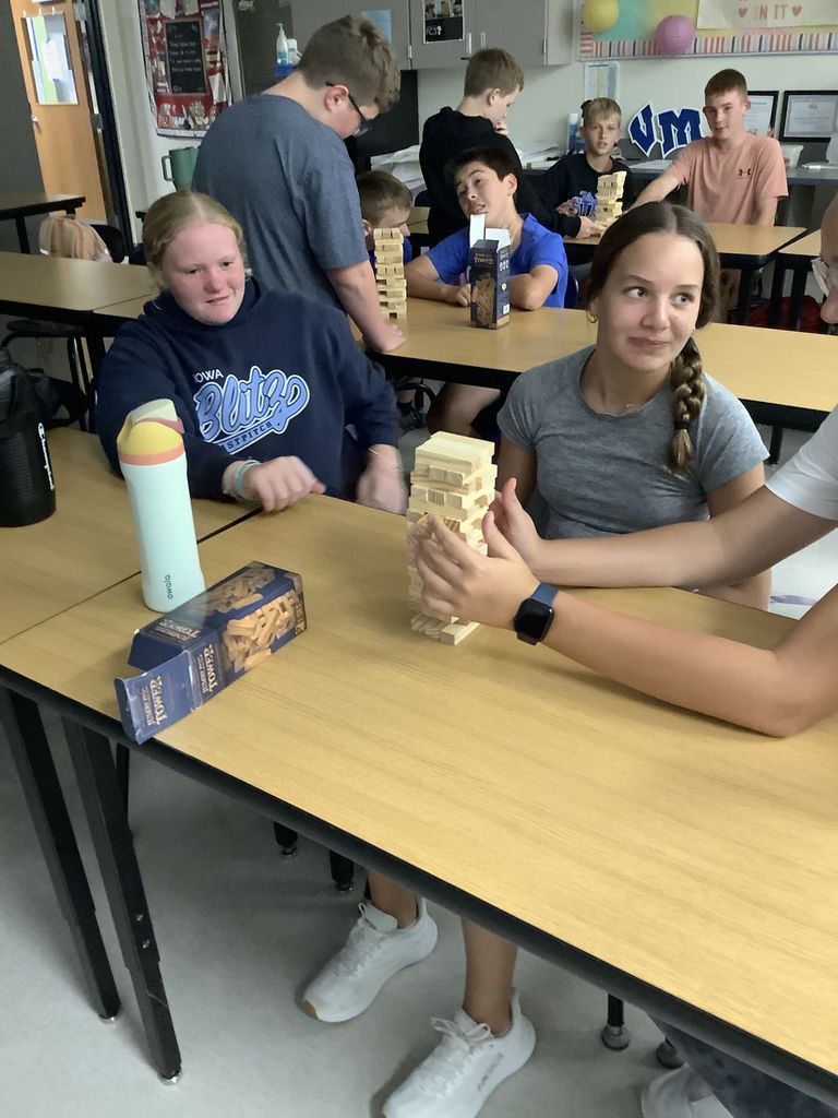 8th graders playing Jenga.
