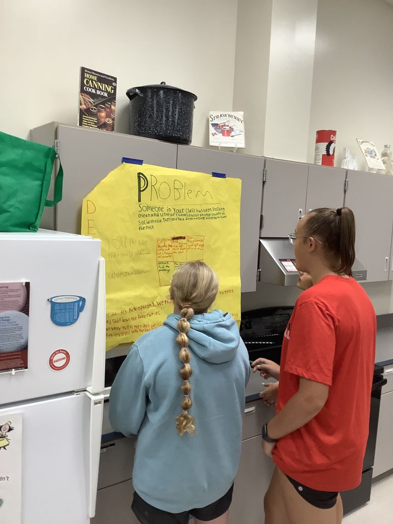 8th graders problem solving in groups.