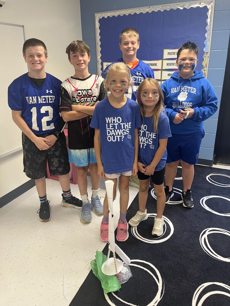 Group of six students smiling for the photo.