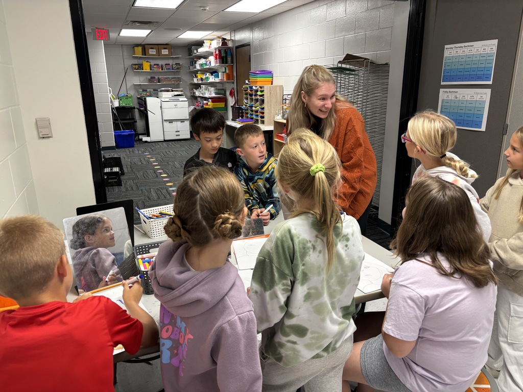 Students talking with the gust in the classroom