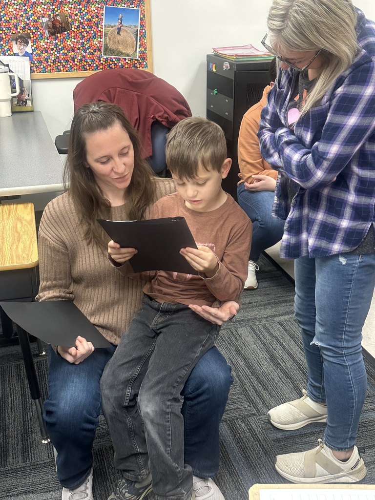 A student with two of their family members