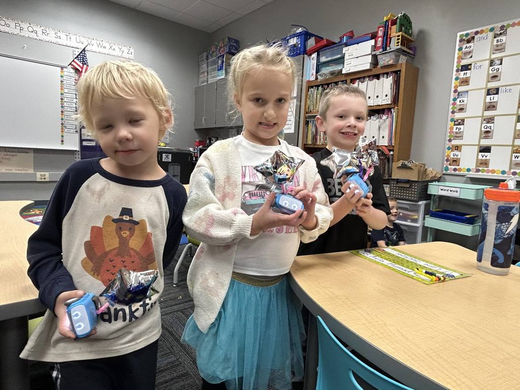 Three students with their mini balloons!