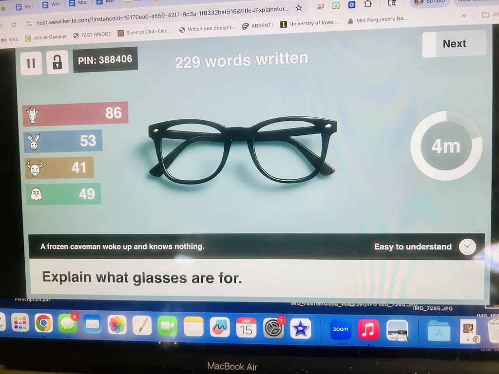 A computer screen is pictured with a pair of glasses and 229 word written about them.