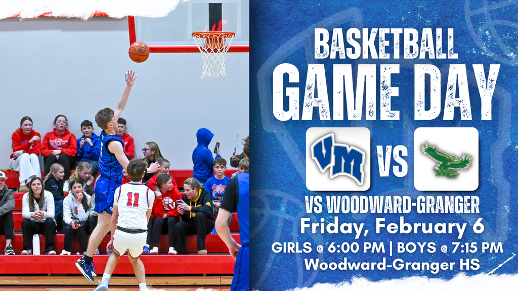 A Van Meter basketball player in blue jumps to shoot while a defender in white tries to block during a game with spectators watching. Basketball Game Day vs Woodward-Granger on Friday, February 6. Girls play at 6:00 PM and the boys at 7:15 PM at Woodward-Granger HS.