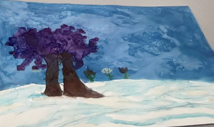 Two purple-leaved trees stand on a snowy white landscape under a cloudy blue sky.