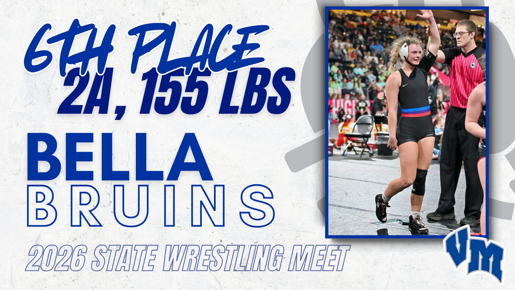 Wrestler Bella from Bruins team having her hand raised by referee after securing 6th place in 2A 155 lbs at 2026 State Wrestling Meet.