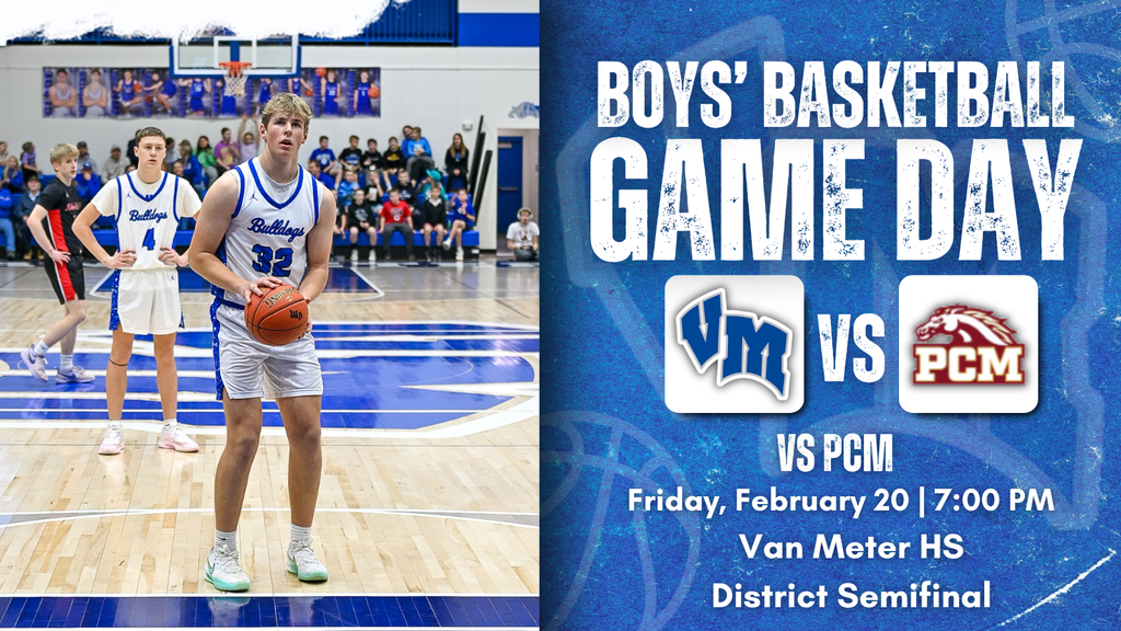 High school basketball player in white jersey holding ball on court during game with spectators in background.
