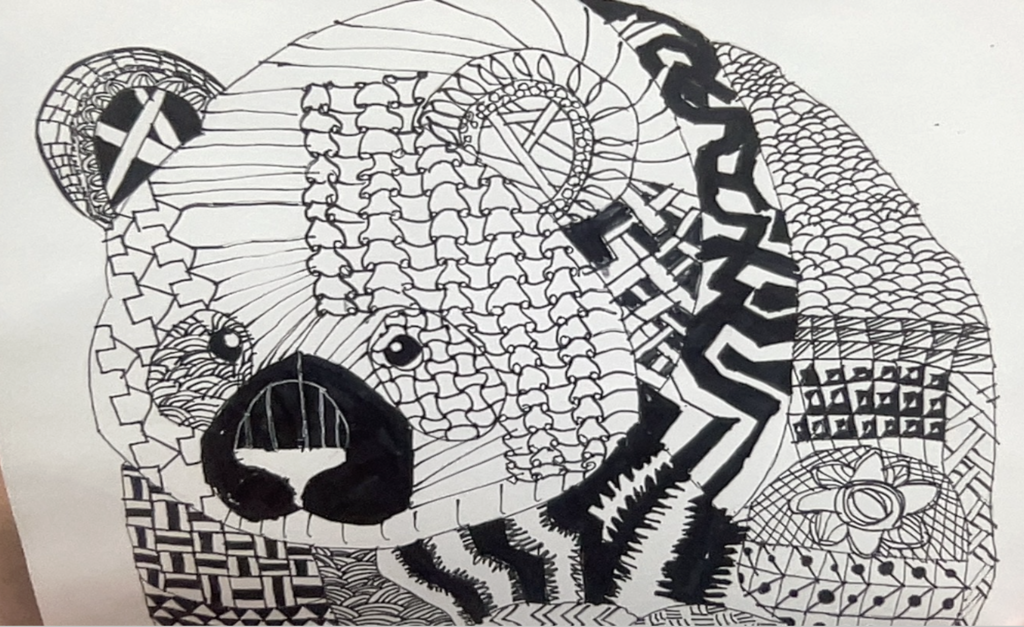 Intricate black and white line drawing of a bear filled with various geometric patterns and textures.