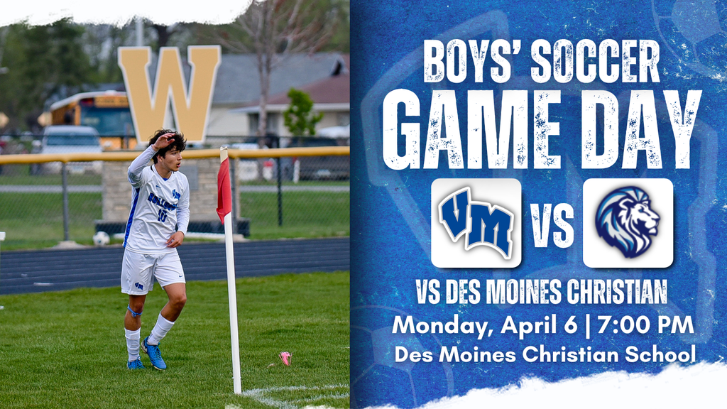 High school boys' soccer player in white uniform near corner flag on field during game day.