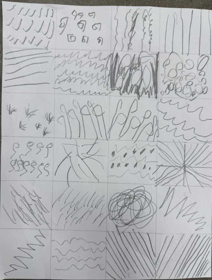 A sheet of paper divided into a grid, filled with different pencil line exercises including straight lines, curves, zigzags, spirals, and shading patterns in each square.