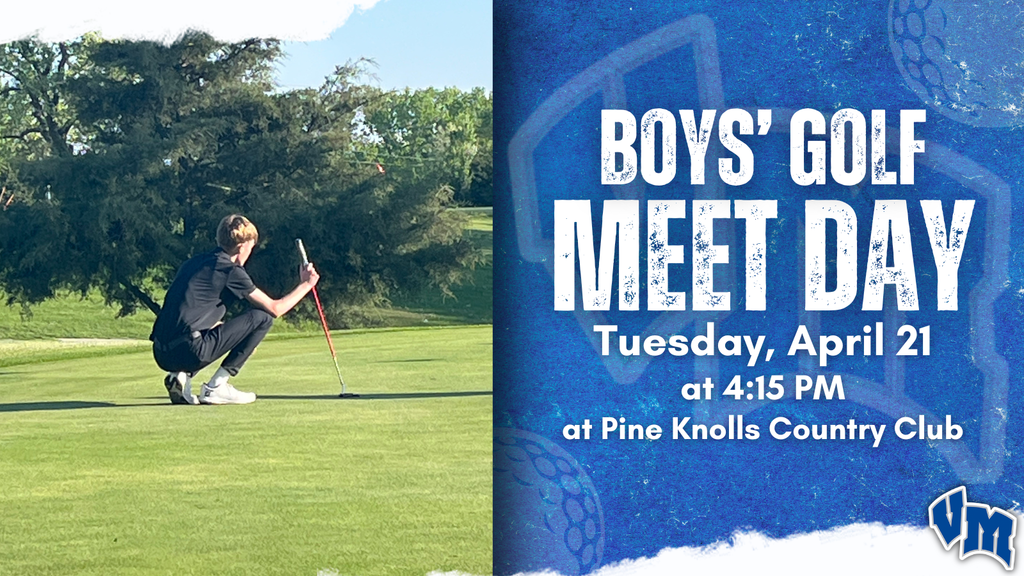 Boy crouching on a golf green lining up a putt during a sunny day.