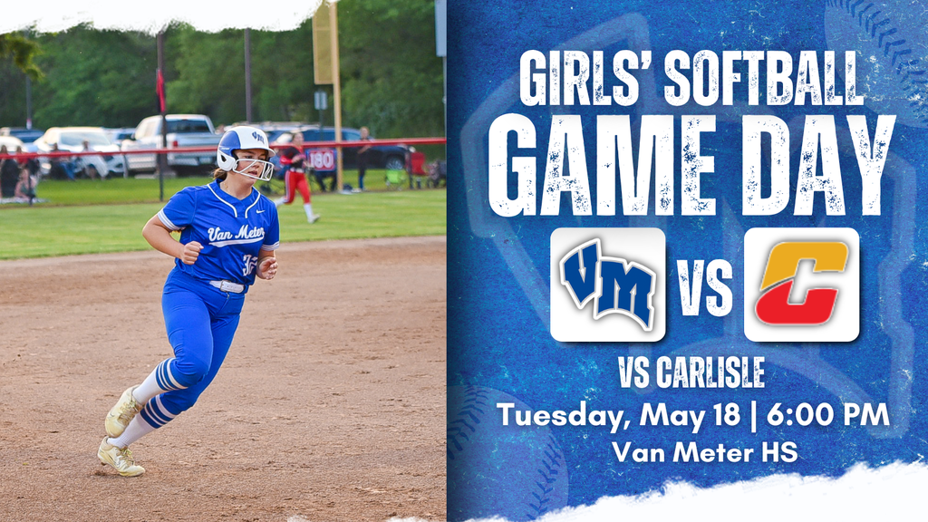 Girl in blue softball uniform running on the field during a game at Van Meter High School.