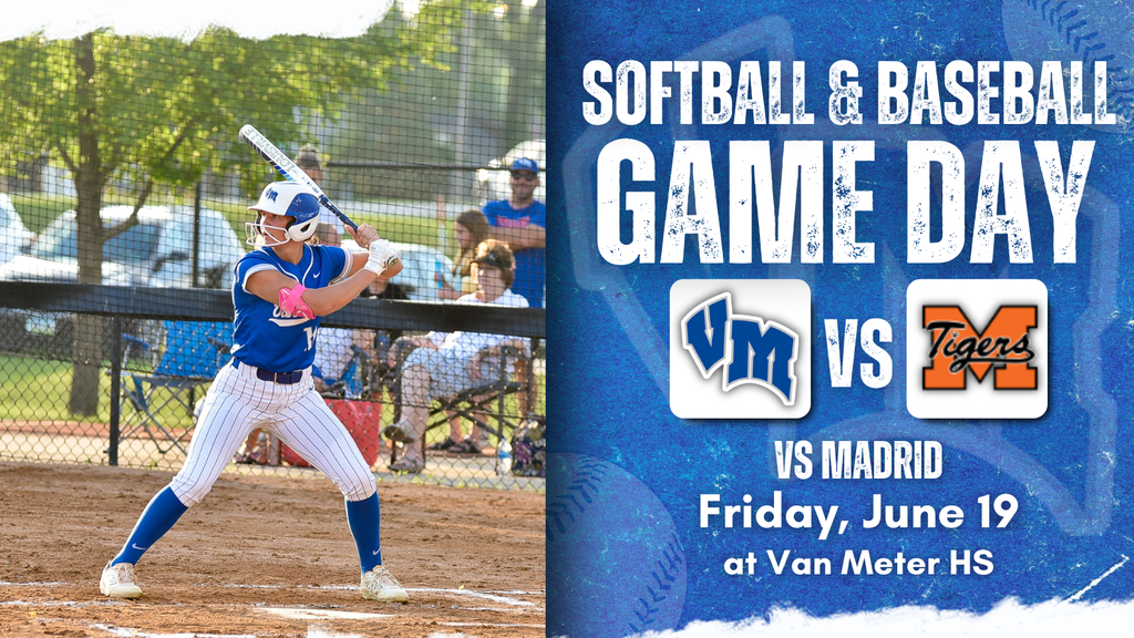 Softball player in blue and white uniform preparing to swing at pitch during game day at Van Meter High School.