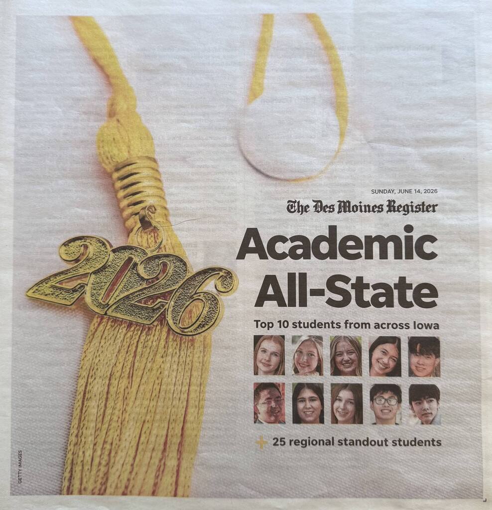 Gold graduation tassel with a 2126 charm displayed next to a newspaper headline honoring Iowa's top 10 Academic All-State students.