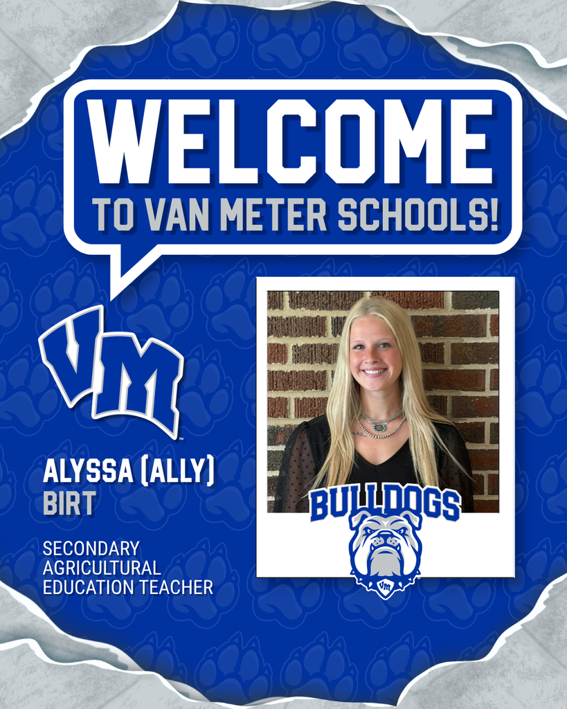 Portrait of Alyssa Birt, new secondary agricultural education teacher at Van Meter Schools, smiling against a brick wall with Bulldogs logo.