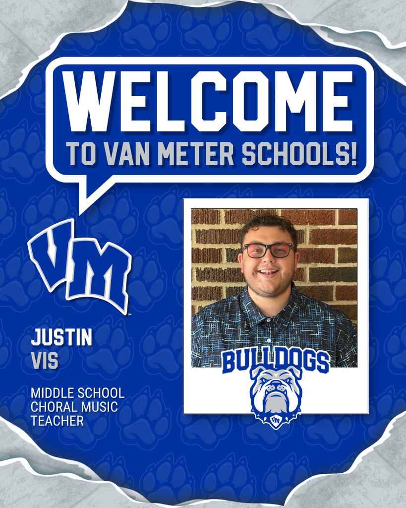 Portrait of Justin Vis, middle school choral music teacher, smiling in front of a brick wall with Bulldogs logo below.
