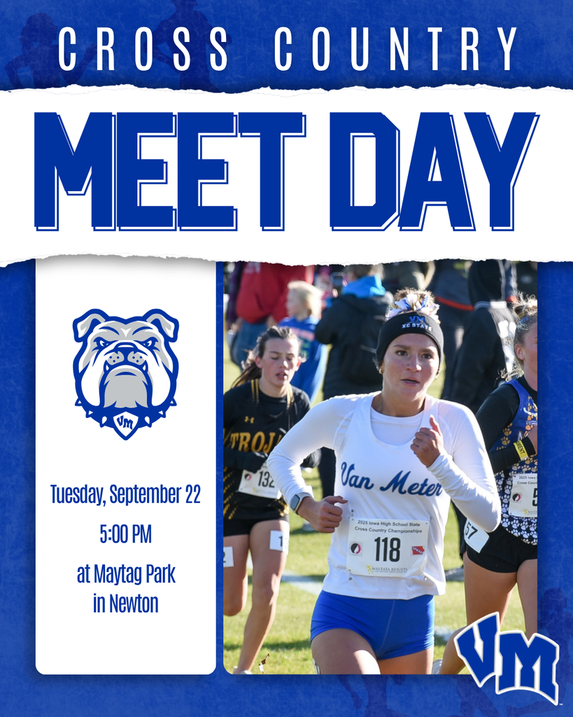 Female cross country runner in white Van Meter uniform competing in a race with other runners behind her.