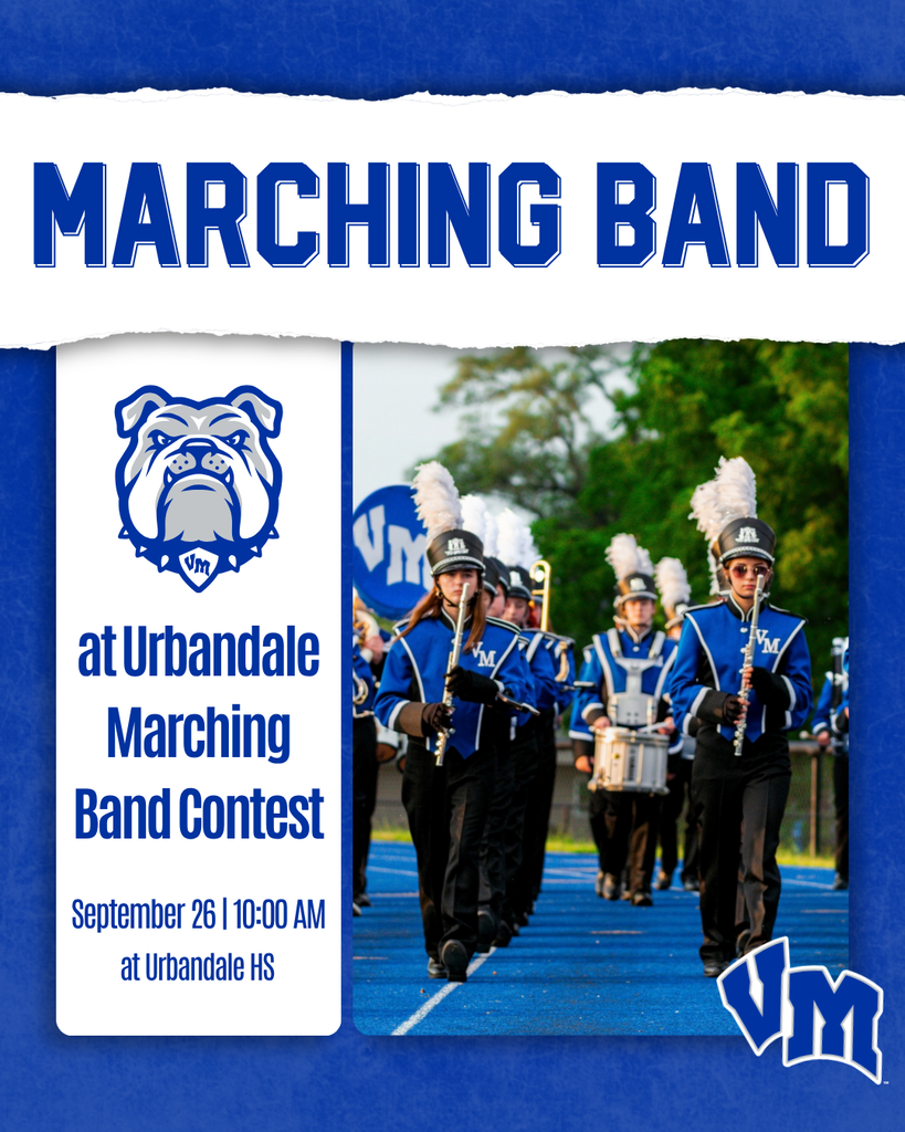 Van Meter High School marching band members in blue uniforms performing on a blue track during a performance.