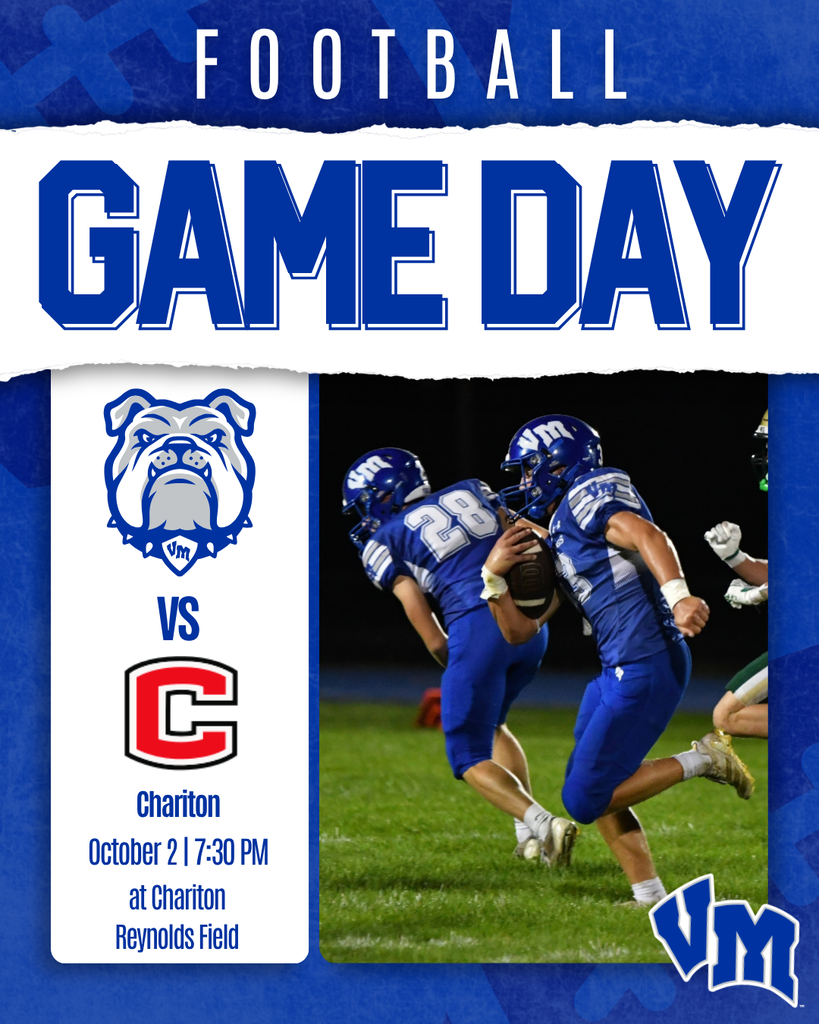 Two football players in blue uniforms sprint on the field during a night game, promoting the VM vs Chariton match on October 2 at Reynolds Field.