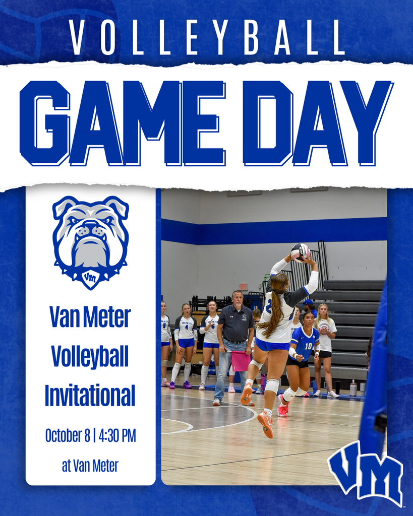 Female volleyball player in blue uniform jumping to set the ball during a match at Van Meter gymnasium.